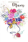This Mother's Day card presents a lively bouquet painted in swirling watercolour, the flowers arranged with the same instinctive harmony a skilled Dollis Hill florist brings to a hand-tied gift. Blossoms in rich purples, playful pinks, and glowing reds open across the page, with calmer strokes of blue and soft lilac nestled between them, creating a rhythm of colour that feels both uplifting and soothing. Each petal is loosely defined by subtle indigo outlines, while highlights of shimmering gold trace certain edges and veins, catching the light like sunshine on fresh blooms set near a window overlooking Dollis Hill's tree-lined streets. The bouquet gathers gracefully into a curved vase, rendered in pale, translucent washes, and finished with an elegant golden bow that hints at satin ribbon and the rustle of wrapping paper used for special deliveries around Willesden Green and Cricklewood. Speckles of paint and delicate heart motifs surround the arrangement, scattered as if in mid-celebration, echoing petals tossed after a hug or laughter shared over breakfast on Mother's Day morning. The clean white background allows every colour to breathe, giving the design an airy, modern feel while keeping the focus firmly on the blooms and the emotion they carry. The artwork conveys warmth, gratitude, and the joy of saying thank you to Mum, like a bouquet that never fades, preserved on paper for families across NW2 who want their message to feel personal, thoughtful, and full of love.